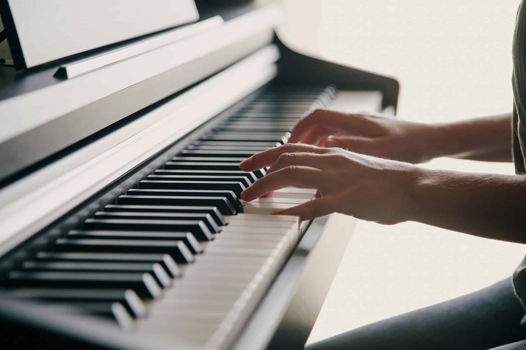 Hands on the piano